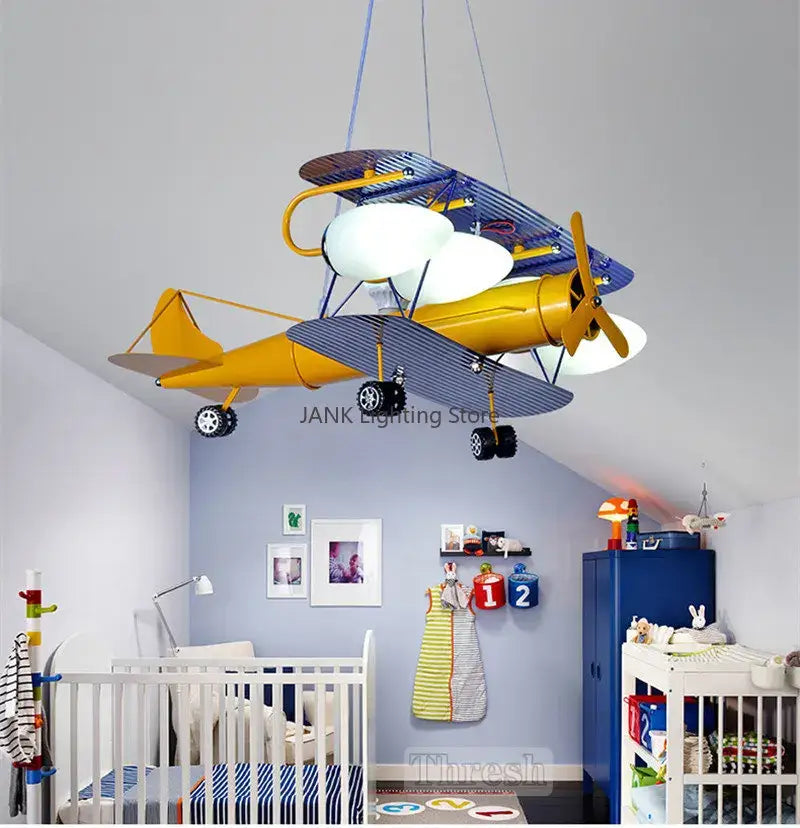 Decorbites airplane kids led chandelier with yellow and blue striped wings and white bulbs for baby boy rooms