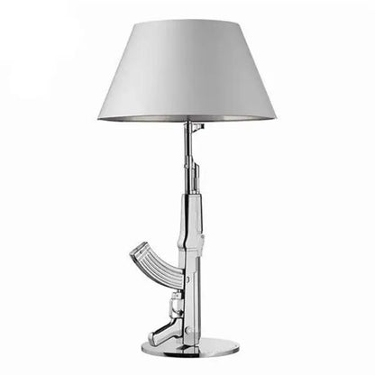 Chrome finished ak47 gun design table lamp with sleek gray conical shade for modern living room and bedside decor
