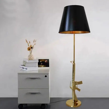 Gold-colored ak47 guns floor lamp with black conical shade and golden interior electroplated metal decorbites floor lamp