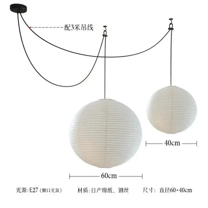White spherical pendant lights made of japanese washi paper and steel wire with akari noguchi led design hanging