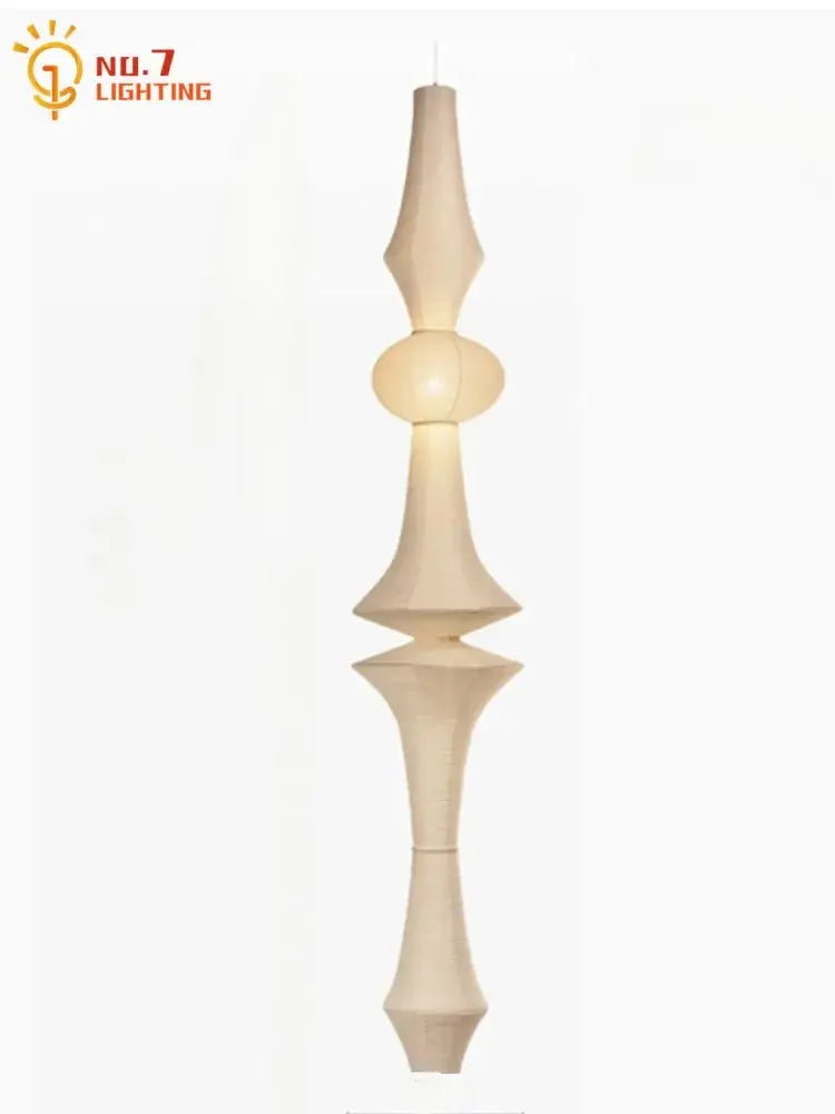 A sleek cream-colored paper pendant light with modern geometric shapes in the decorbites akari noguchi vintage series