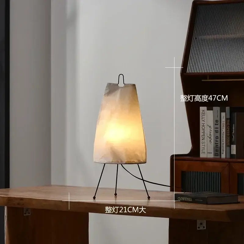 DecorBites™ Akari rice paper floor lamp with a warm-toned tapered shade and minimalist black metal tripod base