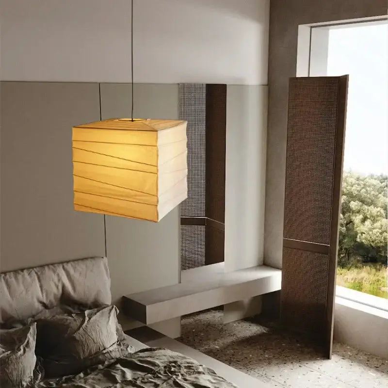 Warm-toned square akari rice paper pendant lamp with horizontal pleats for living room and bedroom decor