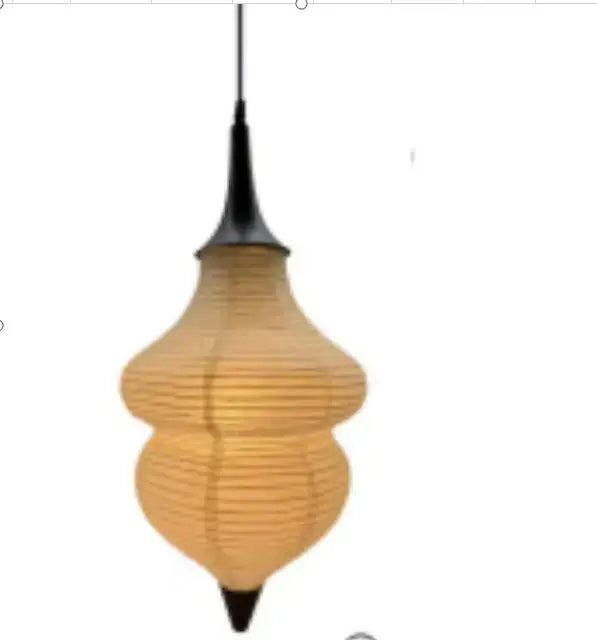 A warm-toned ribbed akari rice paper pendant lamp with black metal accents for living room or bedroom decor