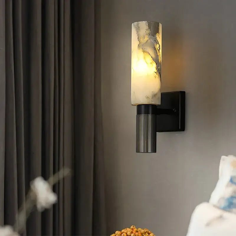 DecorBites™ alabaster copper wall lamp with a translucent marble shade and black metal base LED wall lamp
