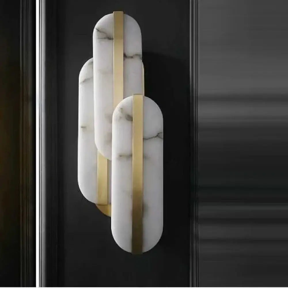 Decorbites™ alabaster moon oval marble wall lamp with three overlapping white marble panels and gold metal strips