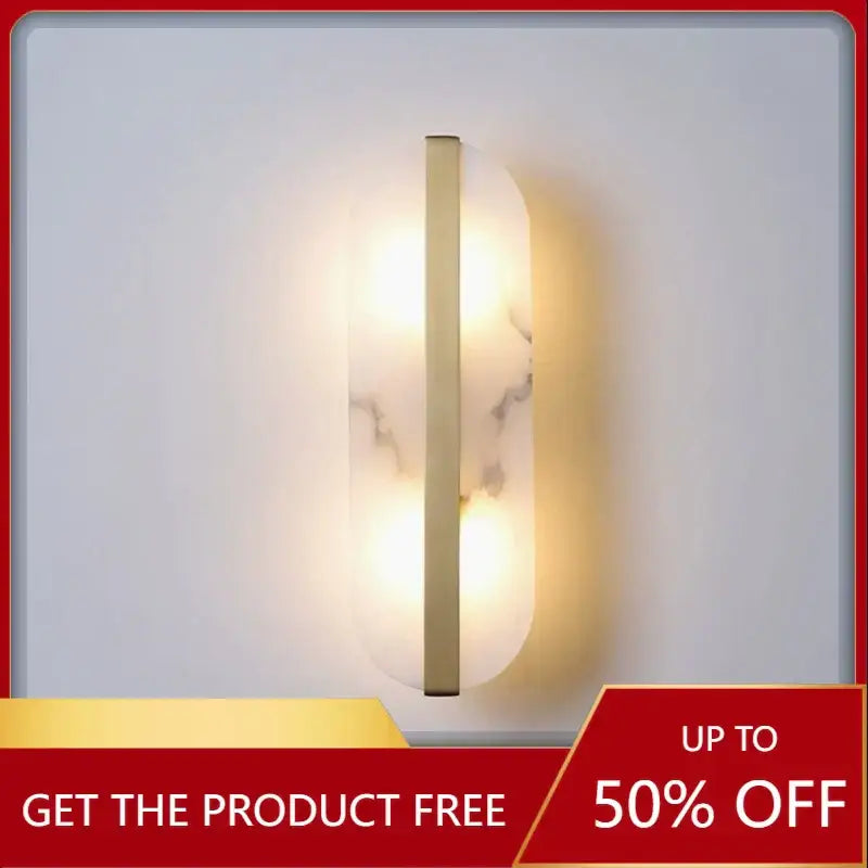 Modern wall lamp with alabaster moon oval translucent marble glass panel in gold frame emitting warm light