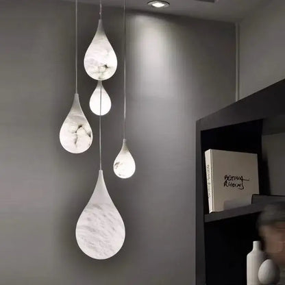 DecorBites™ alabaster pendant lights with white marble effect and subtle gray veining for living room lighting