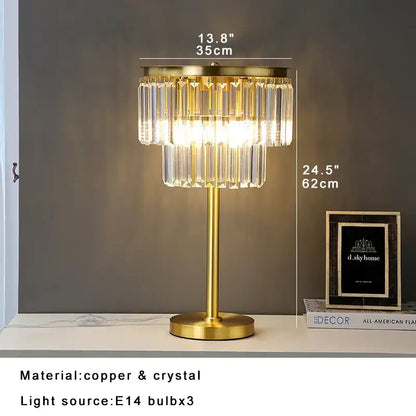 Gold-toned brass crystal floor lamp DecorBites with slender stem and two tiers of clear prisms for luxury living room lighting