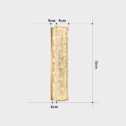 A 50cm tall decorbites™ copper wall lamp with textured gold finish and slim brass frame for light luxury bedrooms