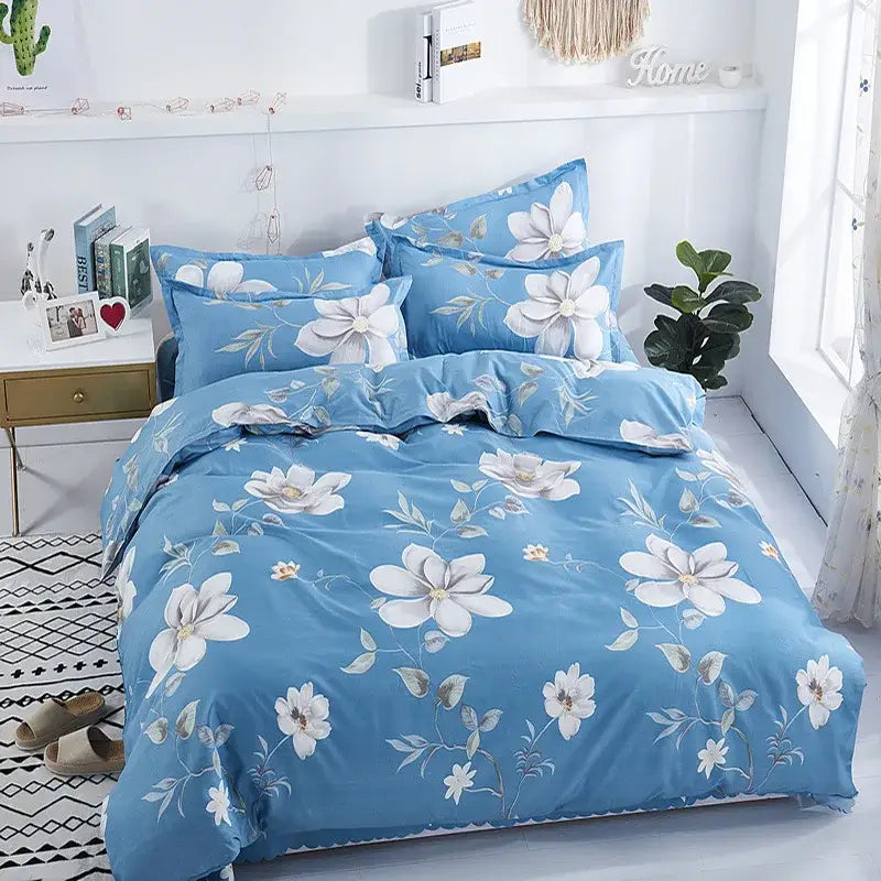 Blue floral comforter set with white and gray blossoms on soft textured fabric in lightweight duvet cover by decorbites
