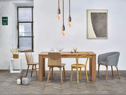 Light wood dining table with matching chairs shown alongside decorbites™ aluminum base e27 lamp holder industrial fixture