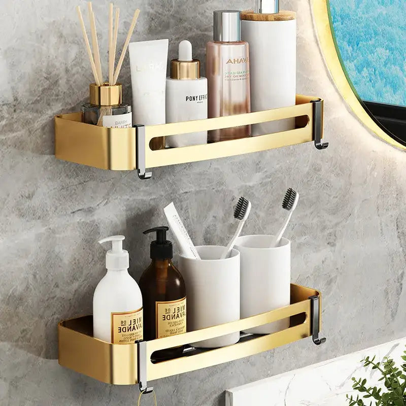 Gold-colored aluminum bathroom corner shelf with sleek modern design and black accent hardware for shower storage