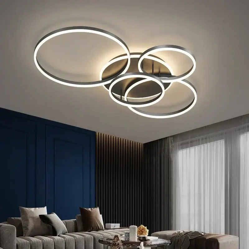 DecorBites aluminum circle led ceiling light with four interlocking metallic rings and white led illumination for living room