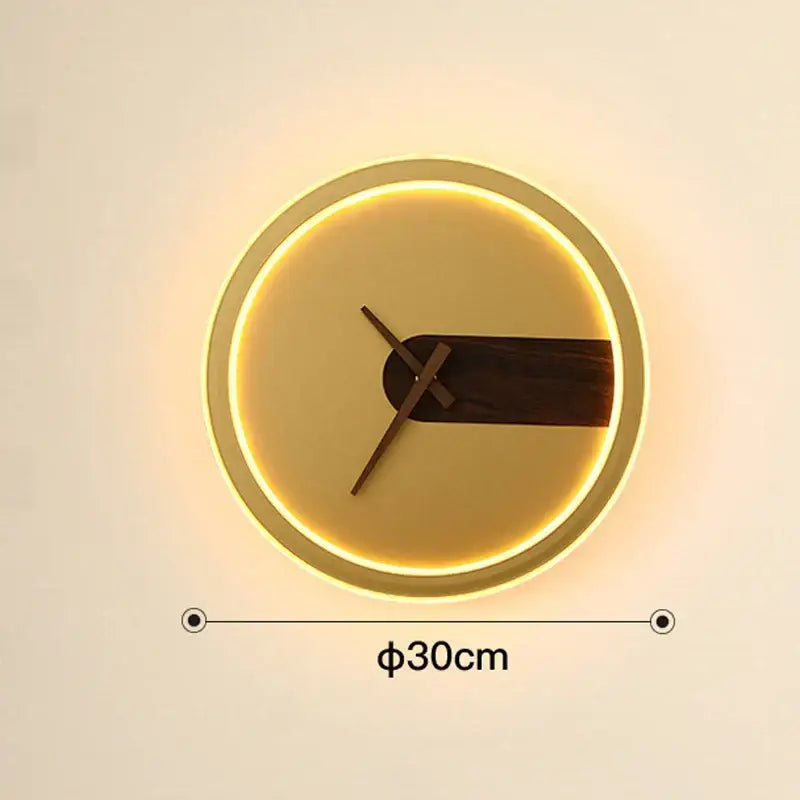 DecorBites aluminum clock wall lamp with warm LED ring and dark wood hands on minimalist beige face for modern spaces