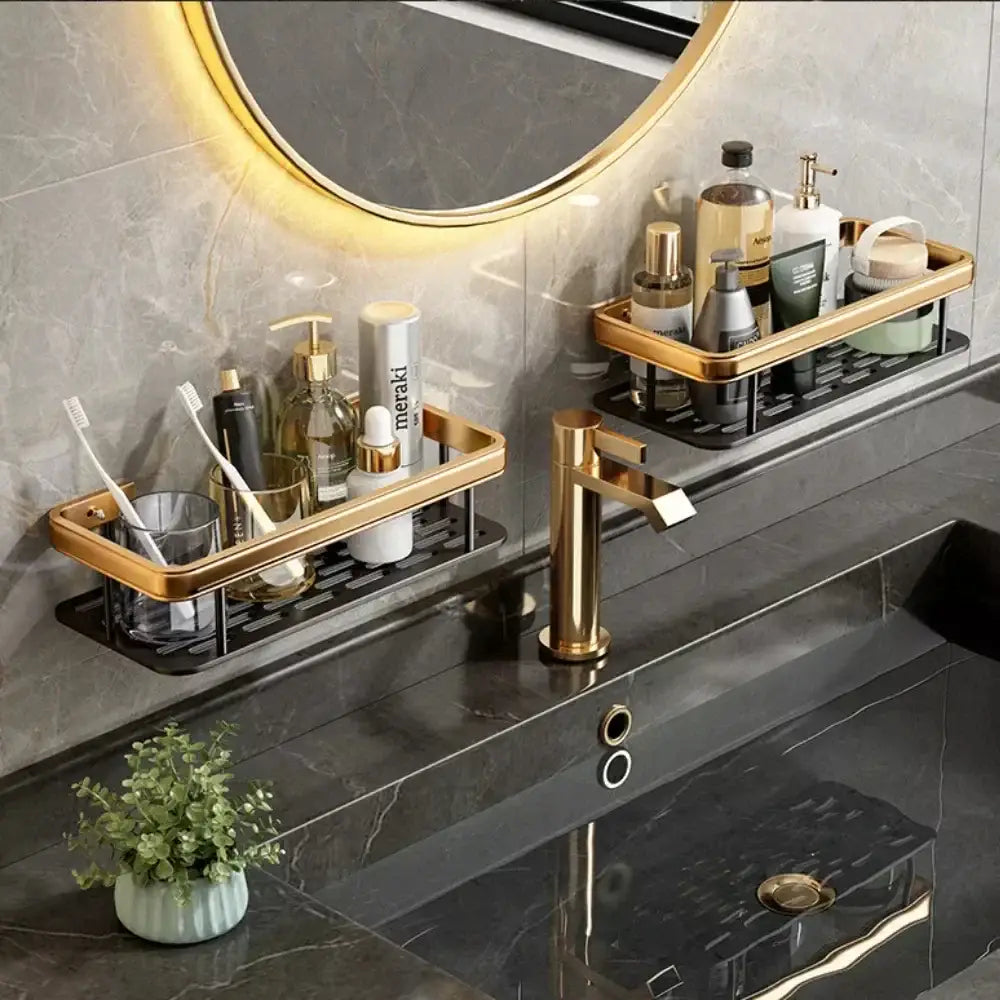 Decorbites aluminum corner bathroom shelf with gold-finished metal frame and black perforated base for modern bathrooms