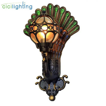 Decorbites™ aluminum globe glass wall lamp with peacock-themed black metal frame and green blue stained glass feathers