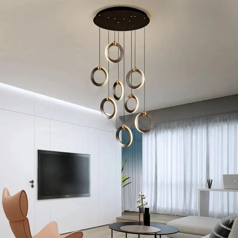Modern black and gold circular aluminum led chandelier with sleek minimalist design for luxury staircase lighting fixtures