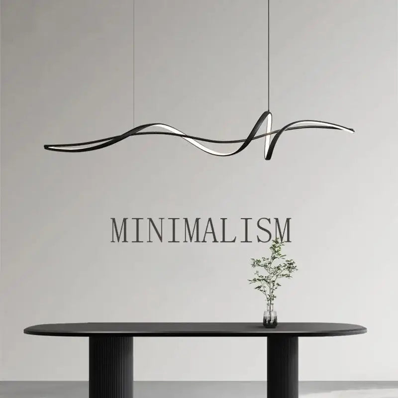 Modern silver aluminum led chandelier with sleek flowing wave design for stylish dining island lighting by decorbites