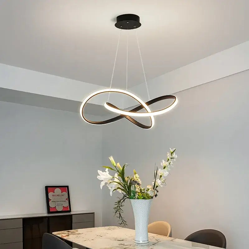 Modern creative dining room aluminum line pendant light featuring sleek black and white infinity-loop led lighting