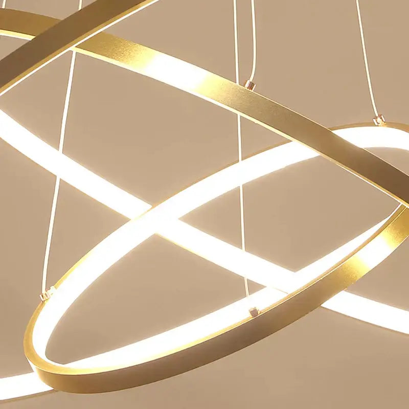 Modern gold-finished decorbites aluminum ring chandelier with intersecting circular rings led ceiling light fixture for kitchen and living room