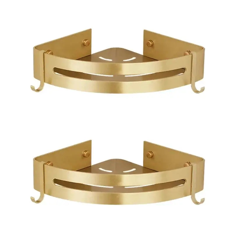 Gold-colored metal decorbites aluminum shower shelf with two hooks and central cutout design for bathroom corner use