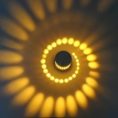 Decorbites aluminum spiral led wall lamp with black base and warm yellow concentric rings for bedroom and living room