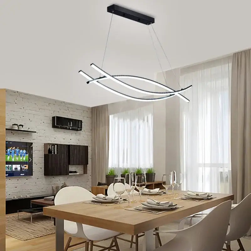 Modern black and white decorbites aluminum suspension led chandelier with sleek curved design hanging above dining table