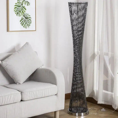 Tall slender floor lamp with sleek black and silver metallic finish made of interwoven wire strands by DecorBites aluminum tower floor