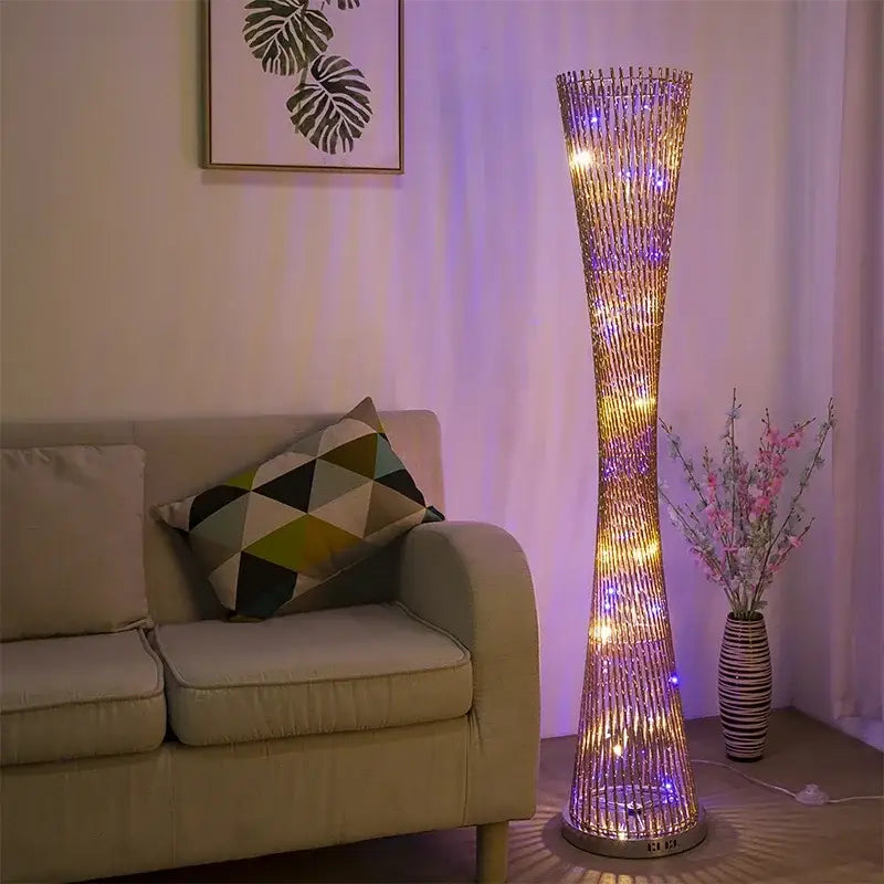 Tall slender decorbites aluminum tower floor lamp with golden woven aluminum design and warm led light for living room decor