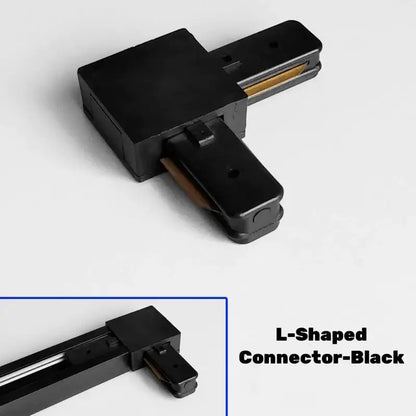 Black l-shaped aluminum track rail connector with matte finish and gold-colored contacts for decorbites track lighting