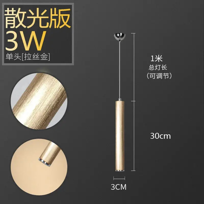Minimalist decorbites pendant light with cylindrical wooden body, brushed gold accents, and adjustable 1-meter length for dining room