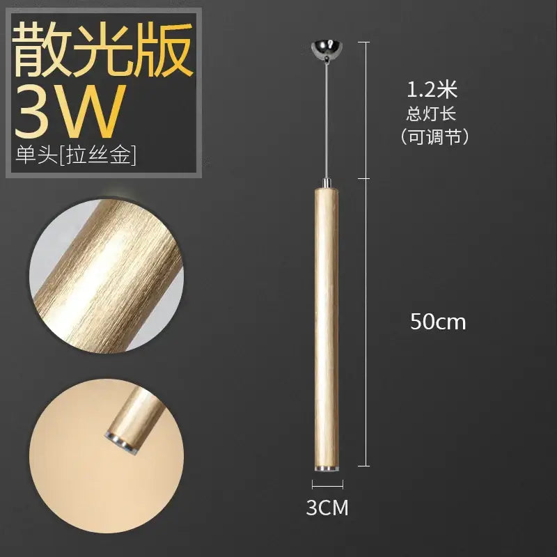 A sleek brushed gold aluminum tube pendant light by decorbites with a 3w led bulb for dining room and kitchen decor
