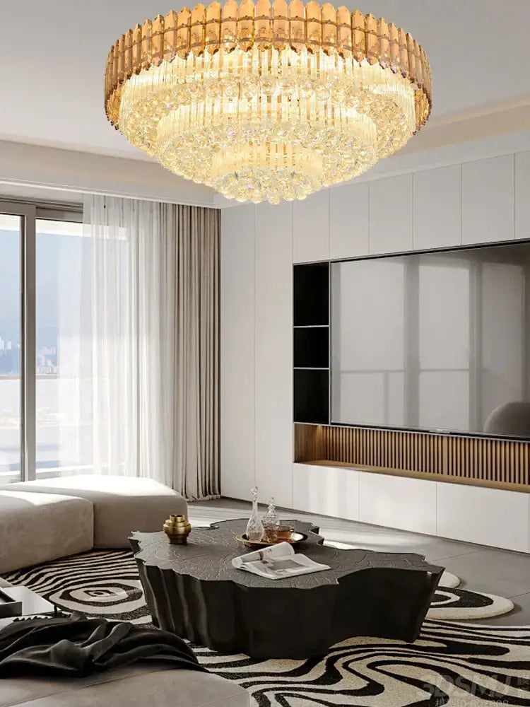 A luxurious decorbites amber crystal ceiling light with golden frame and cascading prisms for modern living rooms