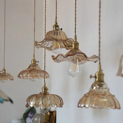 Decorbites amber flower glass led pendant light with delicate amber glass, brass fixtures, and woven cord suspension
