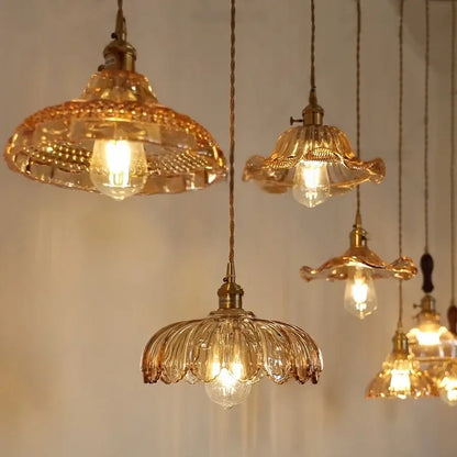 Decorbites amber flower glass led pendant light features golden hand-blown flower glass and brass fixtures