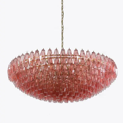 Decorbites amber glass ceiling chandelier featuring faceted translucent pink glass pieces in a circular pattern