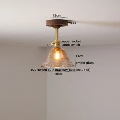 DecorBites™ amber glass copper ceiling light fixture with brass socket and knob switch on dark wood mount