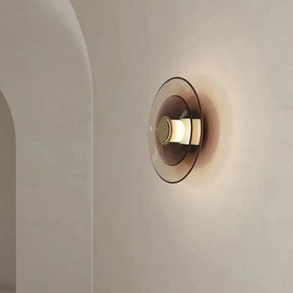 Decorbites amber glass disc wall lamp modern minimalist led wall lamp with translucent amber glass and metallic base emitting warm light