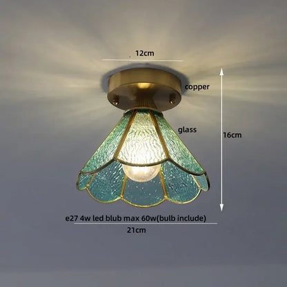 Vintage-style led ceiling lamp with copper base and teal textured glass panels resembling petals by decorbites amber glass led