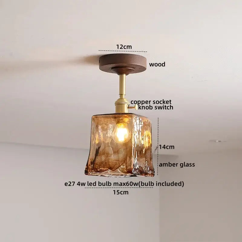 DecorBites™ amber glass led ceiling light with textured faceted amber glass and brass copper knob on wooden canopy