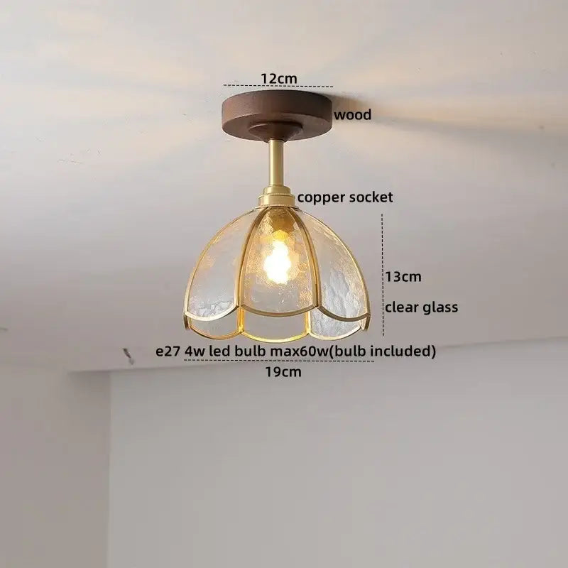DecorBites™ amber glass LED ceiling light with dark wood base and brass copper socket in a vintage flower-shaped shade