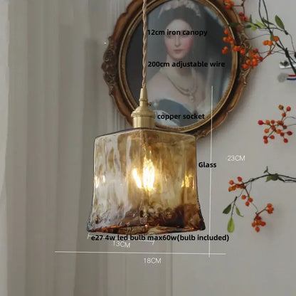 DecorBites amber glass pendant light fixture with warm amber textured glass and brass-finished copper socket