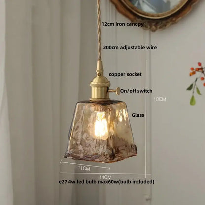 DecorBites amber glass pendant light with warm amber textured glass and brass-finished copper socket suspension