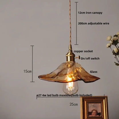 Decorbites amber glass pendant light fixture with warm amber glass shade brass copper socket and twisted iron canopy