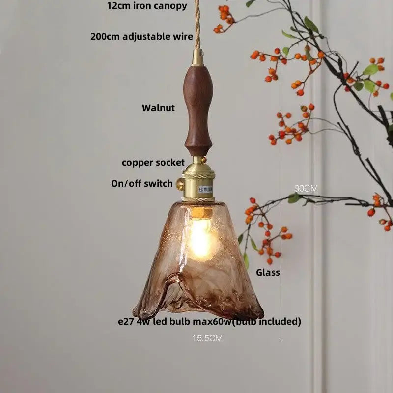 Decorbites amber glass pendant light fixture with warm amber glass, walnut wooden handle, and brass accents