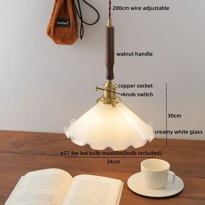 Vintage-style pendant light with creamy white shade brass copper knob and dark walnut handle from decorbites amber glass led collection
