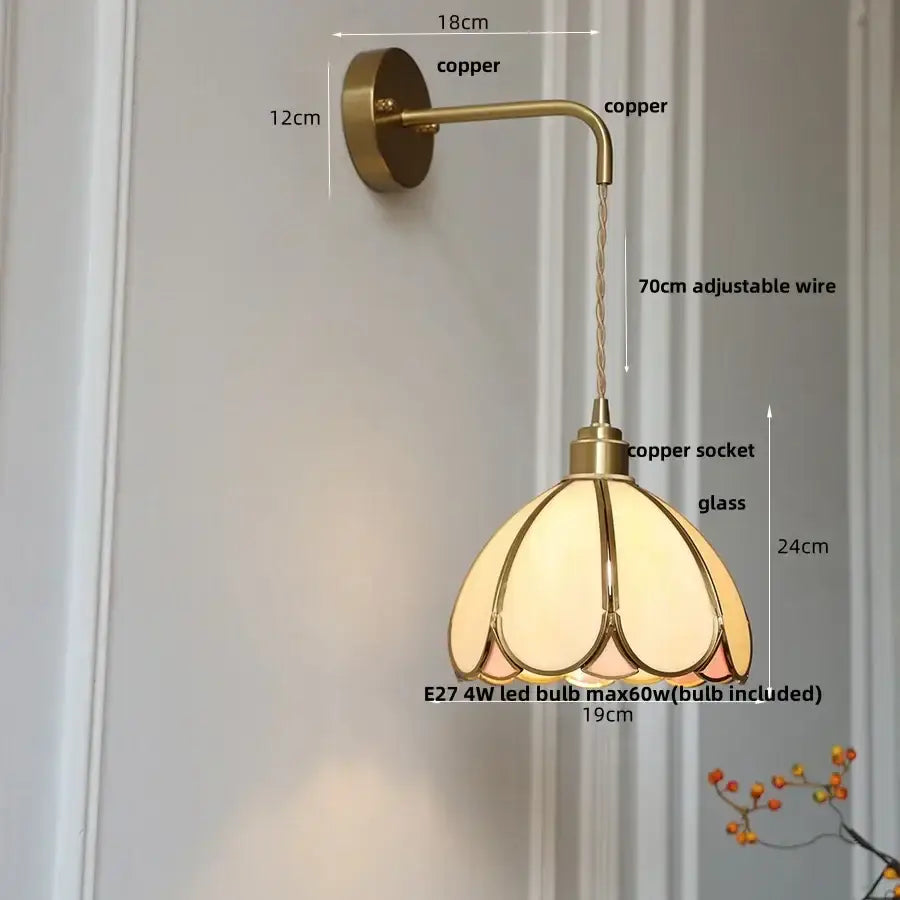 Vintage-style copper led wall light with amber petal-shaped glass shade by decorbites for bedroom and staircase use