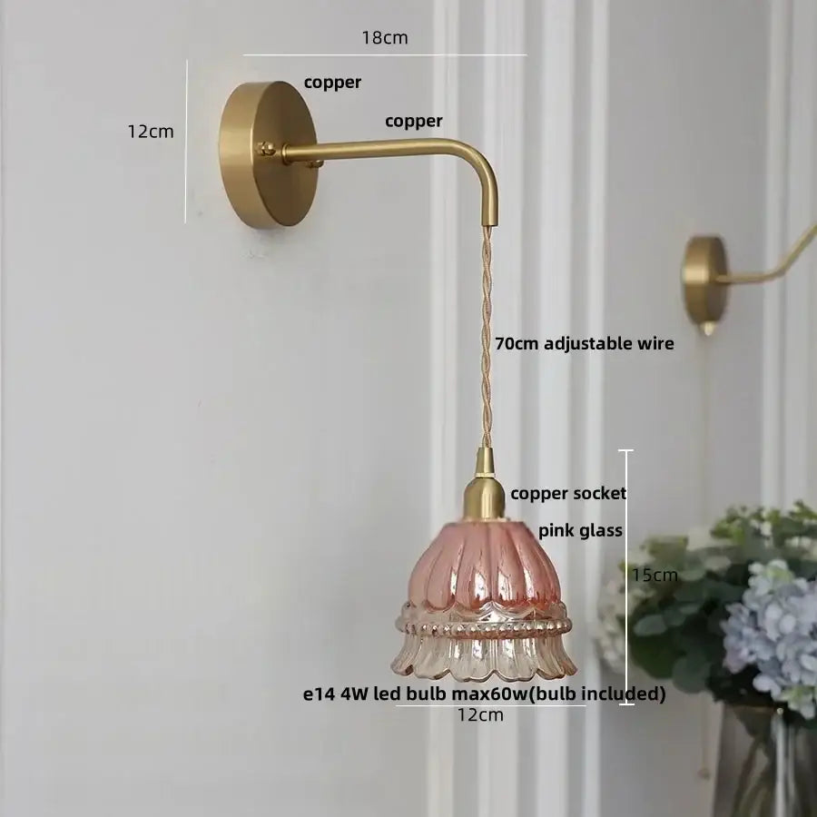 Decorbites amber glass led wall light features a delicate pink fluted glass shade with a copper adjustable arm