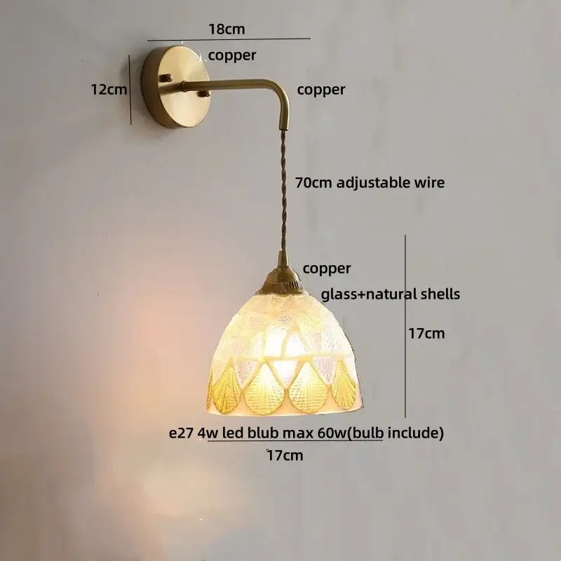 A warm-toned copper wall sconce with decorbites amber glass led and natural shell shade for modern wall lights